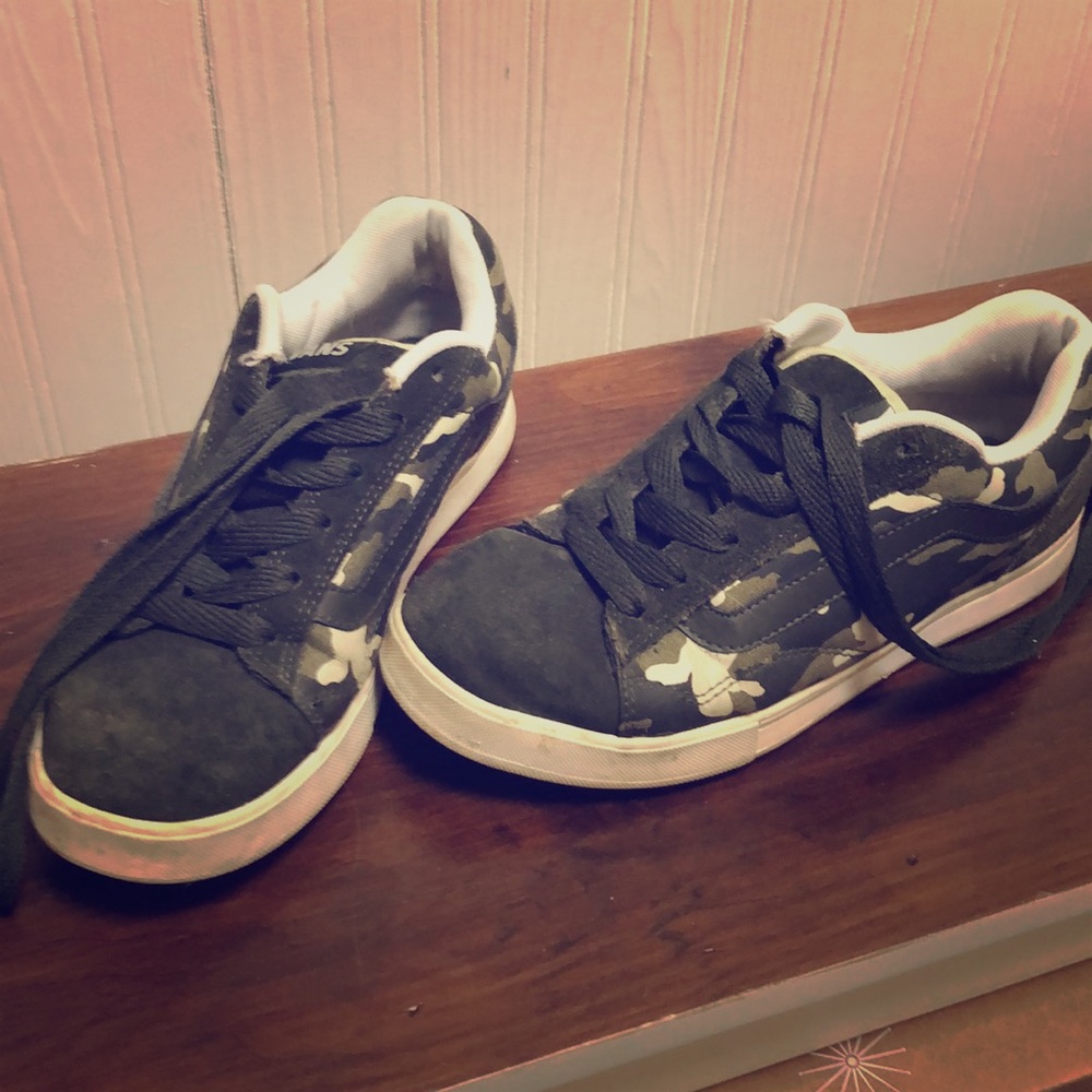 Never worn Vans camouflage sneakers.